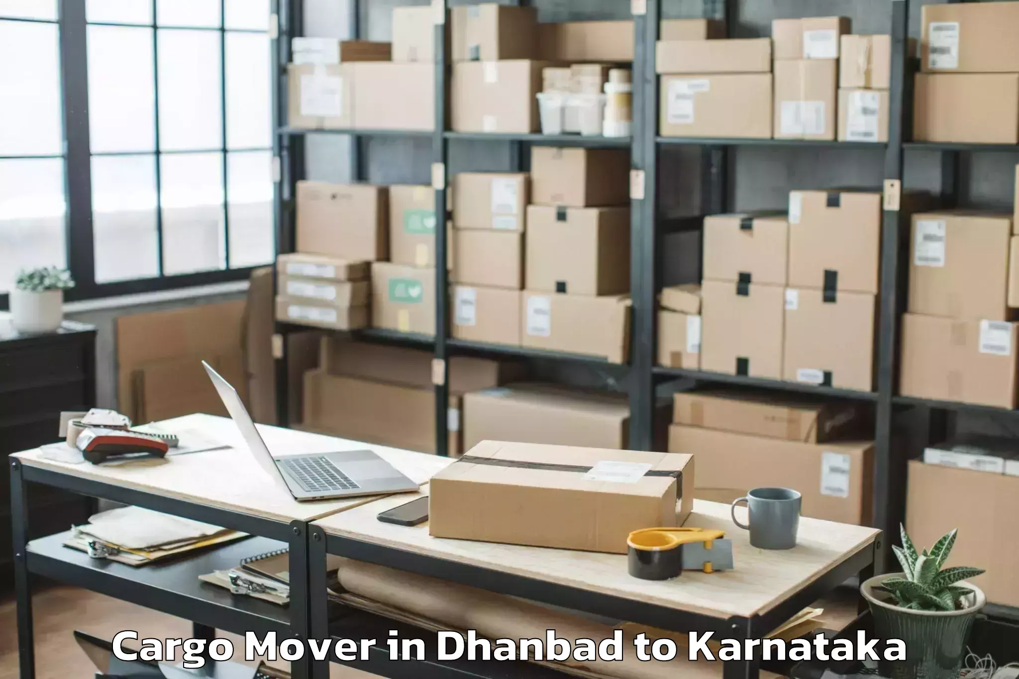 Book Dhanbad to Gonikoppal Cargo Mover Online